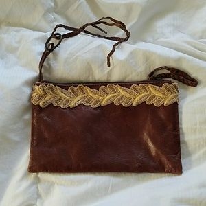 Brown leather Indah clutch with applique